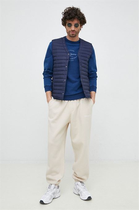 Tepláky Calvin Klein Jeans béžová farba
