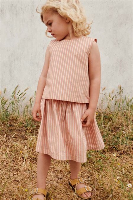 Dievčenská bavlnená sukňa Liewood béžová farba