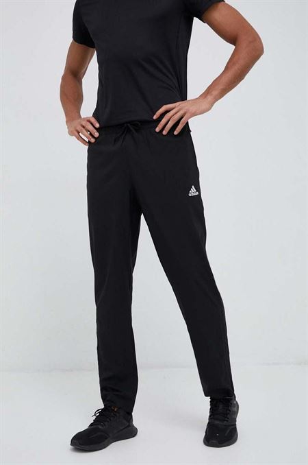 Tréningové nohavice adidas Essentials Stanford čierna farba