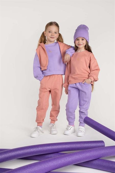 Detské bavlnené tepláky Coccodrillo fialová farba