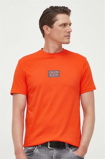 Bavlnené tričko Calvin Klein oranžová farba
